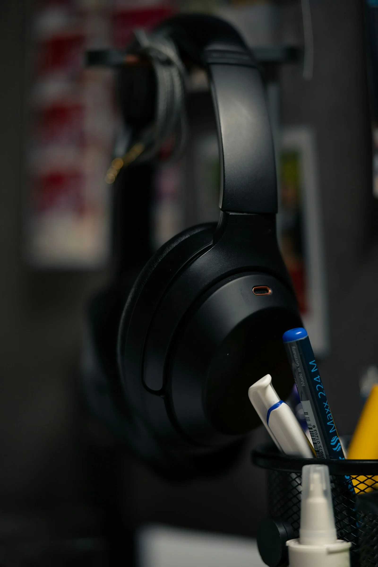 Headphones resting on an office desk